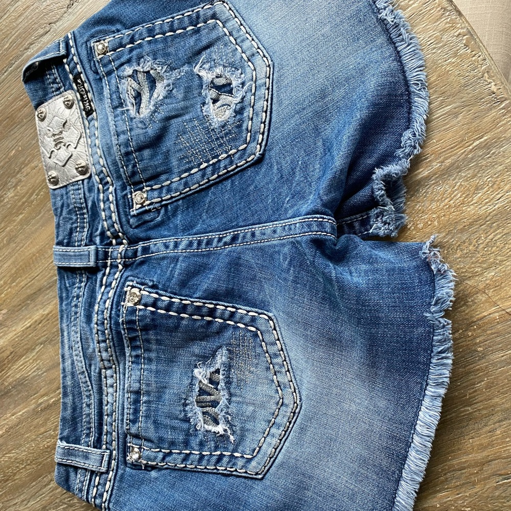 Miss Me jean shorts size 32 waist. 3 3/4 inseam.
